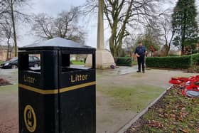 Tim Wood, who volunteers to tidy Mirfield's War Memorial in Ings Grove Park on a regular basis having been involved in organising the town's Remembrance Day parade for over 25 years, says the bin which has been placed on the hardstanding of the Grade II listed monument is in "very, very poor taste".