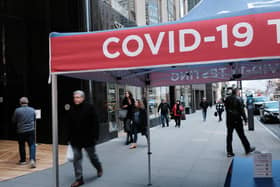 The Administration will end the COVID-19 vaccine requirements for international air travellers at the end of the day on May 11. Photo: Getty Images