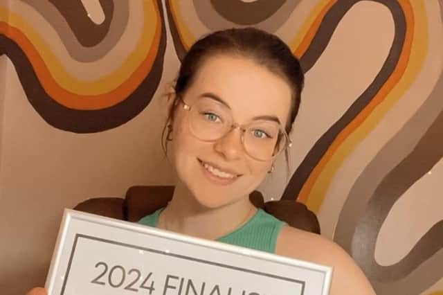 Rachel, pictured with her finalist certificate.