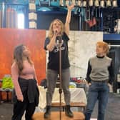 Claire O’Connor, Stacey Sampson, and Victoria Brazier play 3-sisters Isabel, Mary and Olive thrown into the Miners’ strike as Women Against Pit Closures in We’re Not Going Back.. Credit: Red Ladder Theatre Company