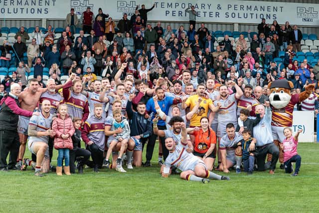 Players and fans celebrate as Batley Bulldogs move to being 80 minutes away from a place in next season's Super League.