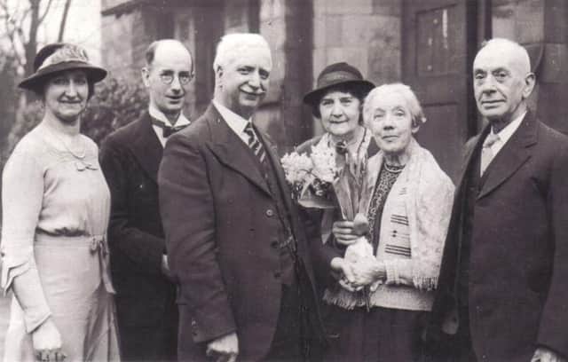 Nostalgia with Margaret Watson: Dan and Harriet Oldroyd (far right) are pictured at their home, 4 Fletcher Homes, with their presentation from members of Dewsbury Council and Parks Department in 1936 to mark their golden wedding anniversary.