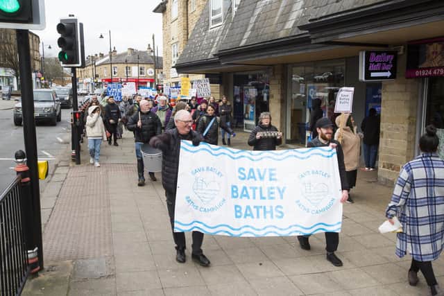 The Save Batley Baths campaigners marching through Batley town centre.