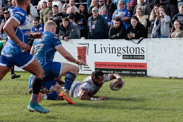 Johnny Campbell reaches out to score a try for Batley Bulldogs at Barrow. Picture: Neville Wright