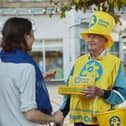 A volunteer at a Marie Curie Great Daffodil Appeal collection raising vital funds for the charity
