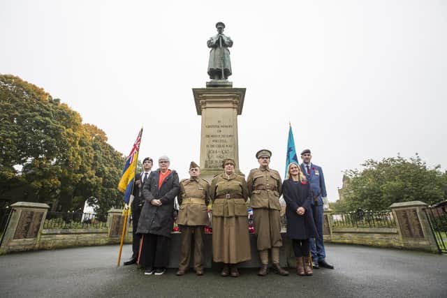 Pictured at a special service to mark the centenary of Batley War Memorial are, from the left, Adam Williams from Batley Royal British Legion, wreath-layer Jane Roberts, Paul Harper, Cheryl Mallinson, Telford Mallinson, Batley and Spen MP Kim Leadbeater and Ian Mayor from Batley and Birstall RAFA