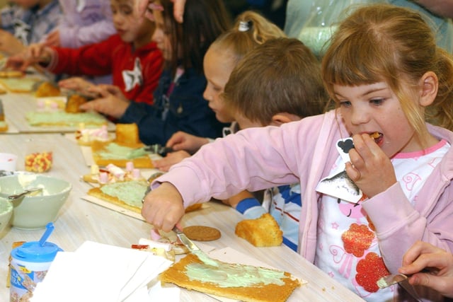 Rebecca Killey sneaks a taste of her Easter garden cake, during activites at Batley Parish School in 2004.