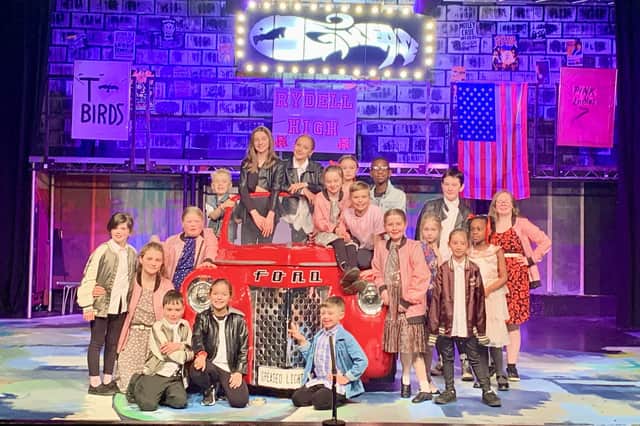 The cast of Grease Junior.