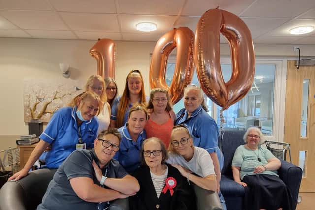 Marion Petyt (front middle) celebrates her 100th birthday at Meadow Green