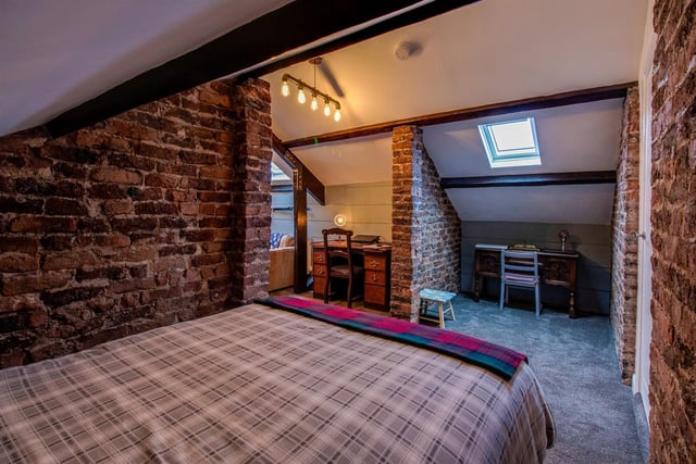 A quirky bedroom is part of the second floor suite.