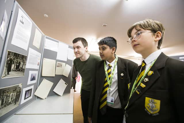 Heckmondwike Grammar School 125th anniversary open day. From the left, former student and former teacher Aleks Lukic-Scott, Muhammed Suleman, 12, and Haydn Gill, 12.