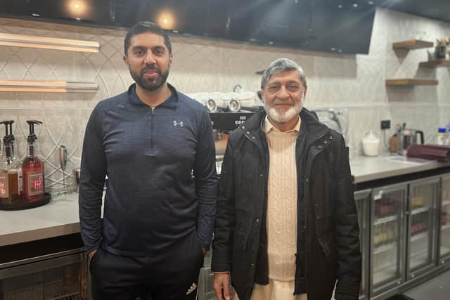 Mohammed Zahoor (left) and his father Manzoor Bahadur at Legends Cafe