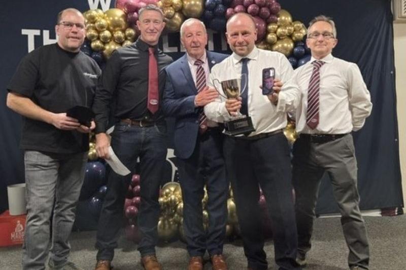 Richard Llewellyn receives the supporters player of the year award on behalf of his son Brad Llewellyn from Phil Robson. Also pictured are Anthony Broadhead (assistant coach), Mattie Roberts (head coach) and Andrew Byram (secretary).