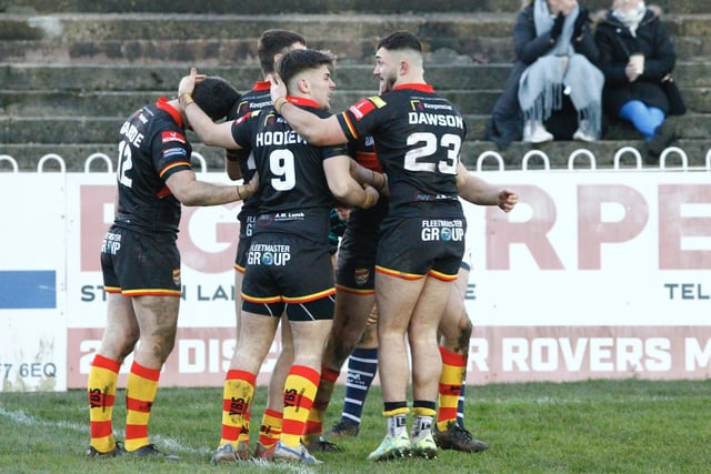 Dewsbury Rams celebrate a try at Featherstone Rovers.