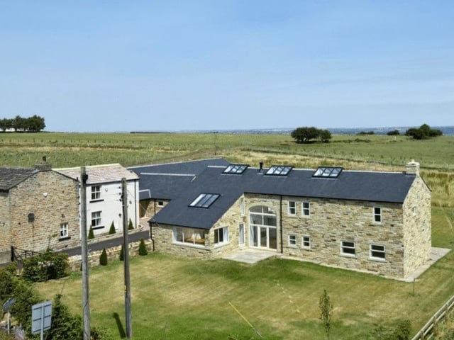 The Barn, Dransfield Hill Farm, Liley Lane, Mirfield, is on sale with Wilcock for offers in the region of £995,000.