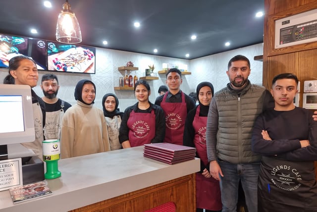 Owner Mohammad Zahoor, second from right, with some of the Legends Café team on opening day.