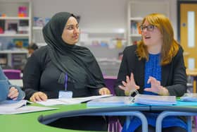 Laura Dixon, right, assistant headteacher at Batley Girls’ High School, working with a sixth form student.