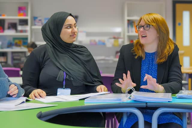 Laura Dixon, right, assistant headteacher at Batley Girls’ High School, working with a sixth form student.