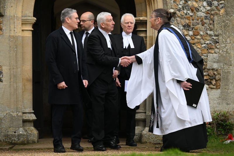 Labour Party leader Keir Starmer and Britain's Speaker of the House of Commons Lindsay Hoyle leave after attending the funeral of former Speaker of the House of Commons, Betty Boothroyd