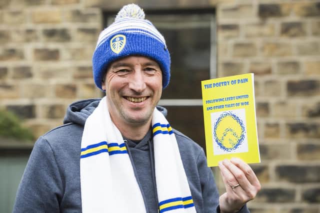 Lifelong Leeds United fan Mike Keddie with his first book The Poetry of Pain.
