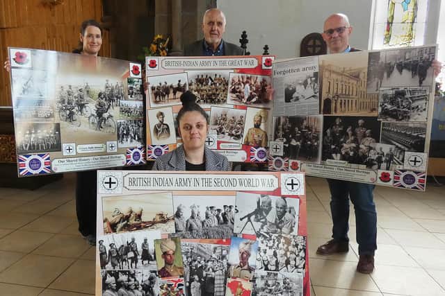 Charlotte Wollard, Peter Charlesworth, Rev Neil Walpole and Tanisha Bramwell, front, with the display boards.