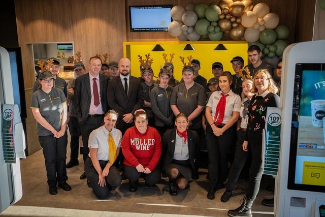 Staff celebrate the opening of the new McDonald’s drive thru in Shaw Cross.