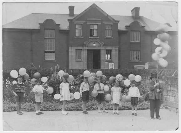 Pupils of the old Thornhill Walker Council School pictured in the summer of 1939 in the schoolyard celebrating "Balloon Day". Pat Sykes is pictured third from the left and the little boy in the top hat was Eric Hobson. If you know the names of the other children, please let us know.