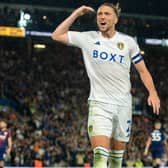 Luke Ayling celebrates after scoring Leeds United's equaliser against West Brom.