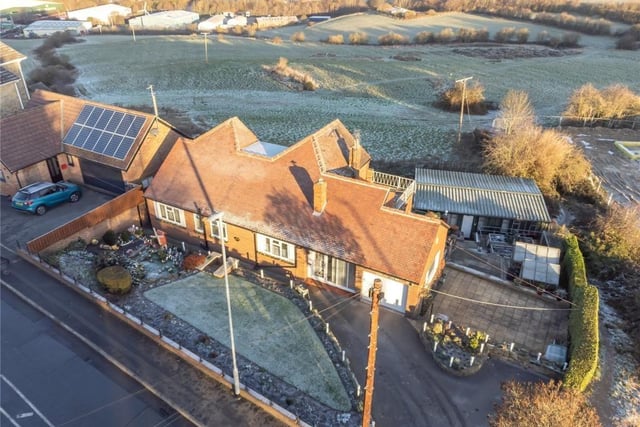 An overview of the property and its sizeable plot in Hanging Heaton.