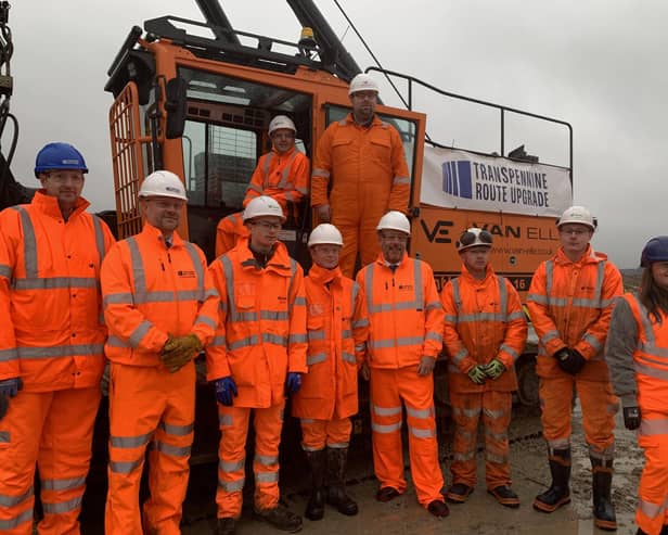 Mark and Huw Merriman with apprentices at the TransPennine Upgrade site in Ravensthorpe.