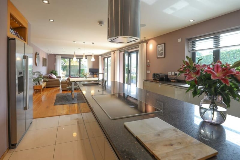 The sleek open plan living and dining kitchen.