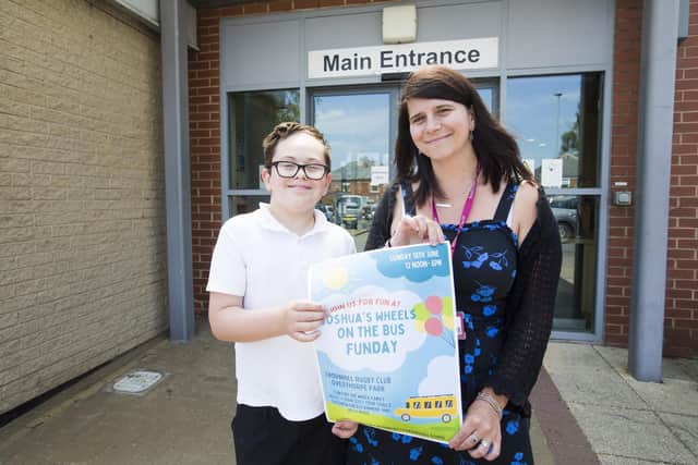 Ravenshall School pupil Josh, 11, and fundraising manager Charlotte Gray-Sharpe, ahead of the Joshua’s Wheels on the Bus Fun Day event this coming Sunday to raise money for a new mini-bus.