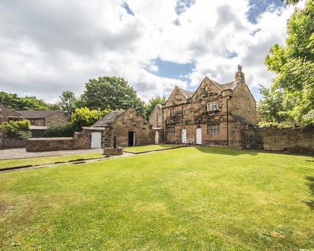 Combs Hall on Combs Road, Thornhill, is currently for sale on Rightmove for a guide price of £489,999.