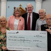 Pictured from the left are Sarah Tolson, president of Dewsbury Collegians; Marion and Malcolm Kenyon; Stephen Rawlinson, Worshipful Master of St John's Lodge; and John Hudson, charity steward of St John's Lodge