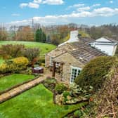 A home with pretty gardens and rural surroundings that is also within easy reach of business centres and the motorway network.
