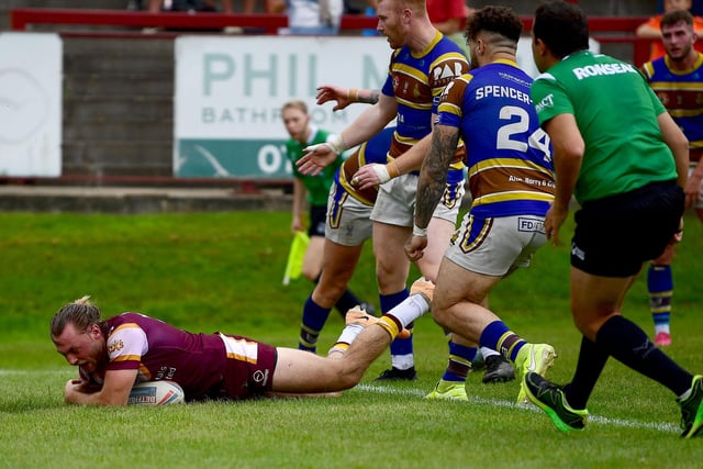 Jimmy Meadows goes over for one of his two tries against Whitehaven.