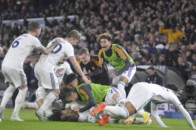 It's all fall down as Leeds United celebrate their winning goal against Bournemouth.