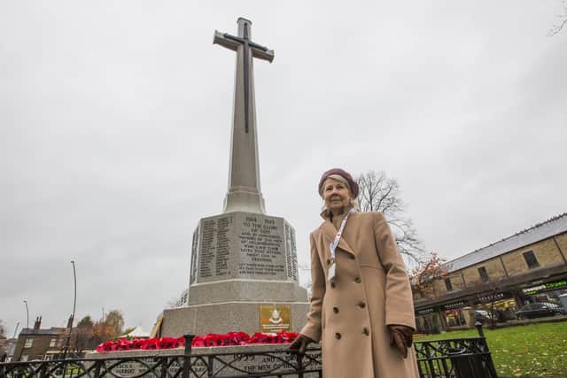 Rosemary Hartley, vice chair of the Heckmondwike Royal British Legion, with the newly restored war memorial at Green Park, Heckmondwike.