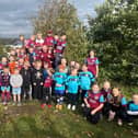 Children at Littletown Juniors Football Club held a sponsored walk to raise over £4,000 for new equipment and netting, in addition to a possible barrier to prevent joyriding vandals destroying their pitches.