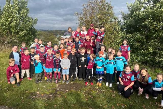 Children at Littletown Juniors Football Club held a sponsored walk to raise over £4,000 for new equipment and netting, in addition to a possible barrier to prevent joyriding vandals destroying their pitches.