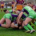 Brandon Moore, on his 200th career appearance, goes over for Batley's second try against Castleford Tigers. Photo by Paul Butterfield.