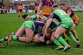 Brandon Moore, on his 200th career appearance, goes over for Batley's second try against Castleford Tigers. Photo by Paul Butterfield.