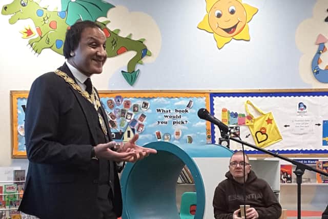 The Mayor of Kirklees, Councillor Masood Ahmed reading his true story.