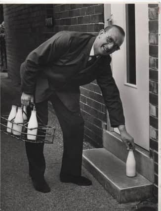 After the war, popular milkman Ronnie Ellis went back to work in the family business delivering milk. He is pictured delivering his last pint on the day he retired.