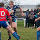 Featherstone Lions' Harvey Farrar makes a surge at the Great Britain Police line.