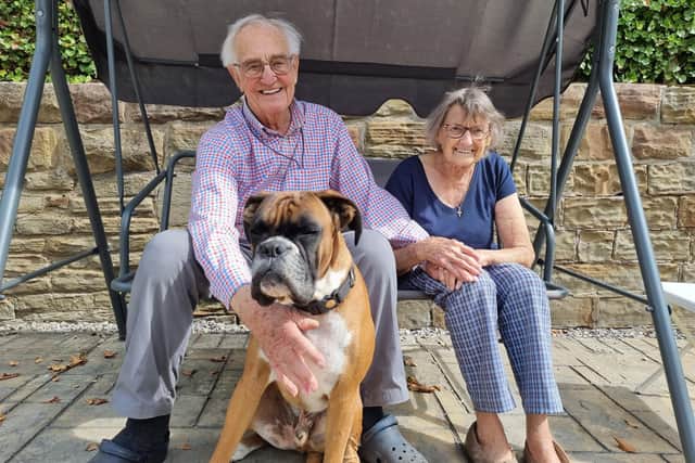 John and Margaret Prentice with their beloved Boxer dog, Jamie