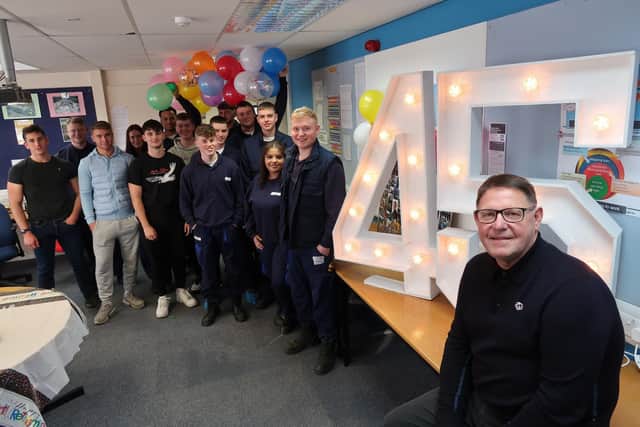 Huddersfield Syngenta site apprenticeship manager Ian Nunn celebrates his retirement with young apprentices.