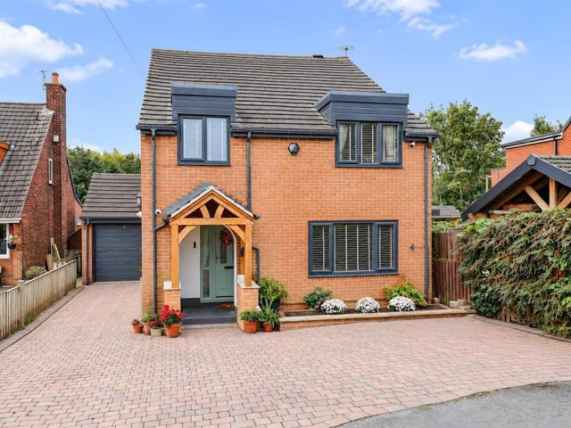 This property, on Parkfield Way in Mirfield, is on sale with SnowGate Estate Agency, priced £495,000.
