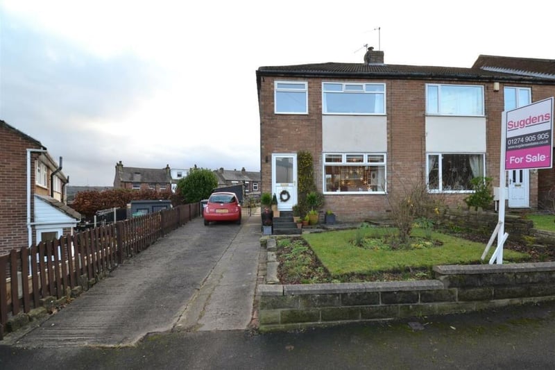 This property on Crossley Lane, Mirfield, is on sale with Sugdens priced at £230,000.