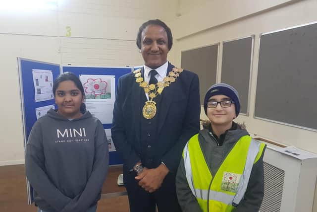 The Coronation clean-up was attended by the Mayor of Kirklees, Masood Ahmed and local school children.